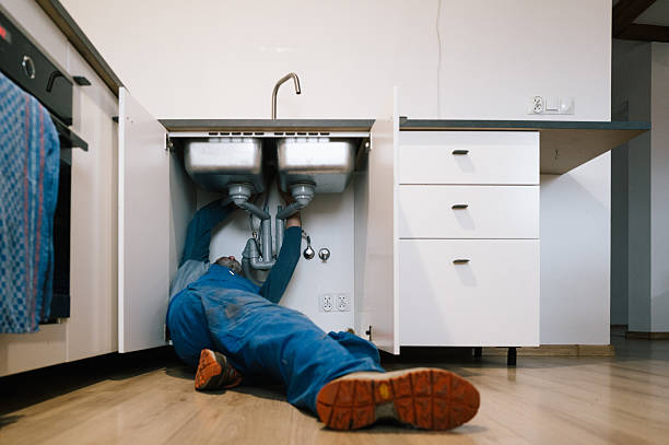 Professional Drain Cleaning technician working in Swansea, MA